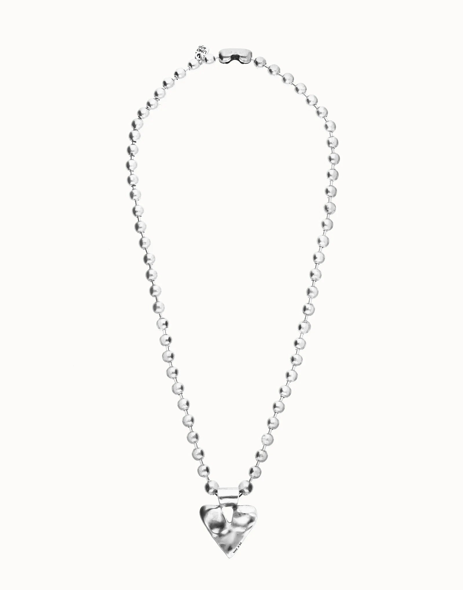Long beaded necklace with a large, shiny heart-shaped pendant at the center; available in multiple sizes.