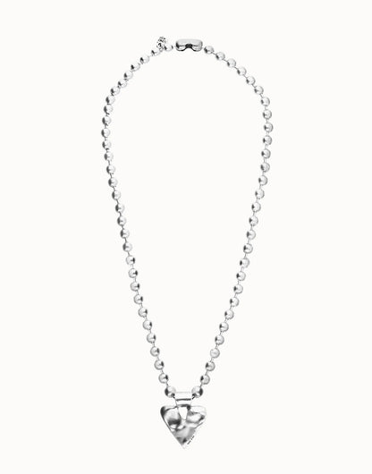 Long beaded necklace with a large, shiny heart-shaped pendant at the center; available in multiple sizes.