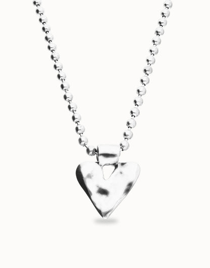 Silver-plated long necklace with beads and a hammered heart-shaped pendant. Available in multiple lengths.