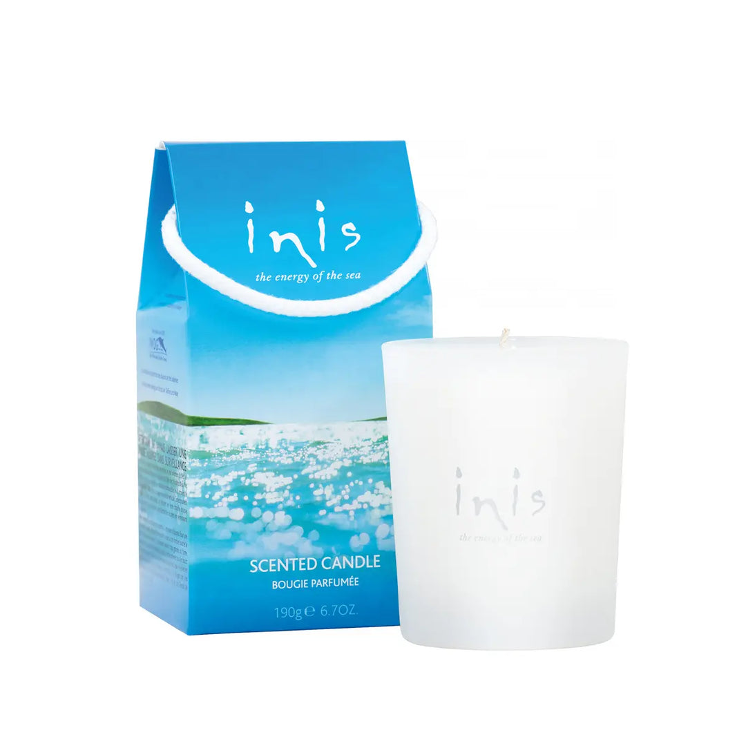 White frosted glass Inis Fragrances of Ireland candle. Available in 6.7 oz size. Unisex scent, "the energy of the sea.