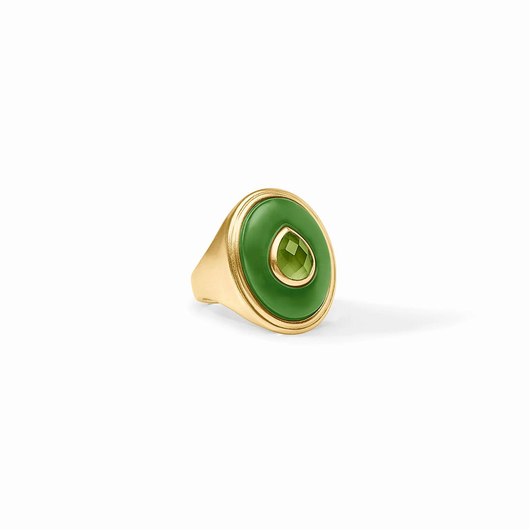 The Carnaby Statement Ring features a 24K gold band, large Palmetto Green stone, and oval gem. Available in sizes 5-9.