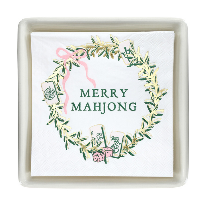 Square white ceramic Merry Mahjong Napkin Tray with “MERRY MAHJONG” wreath and tile print.