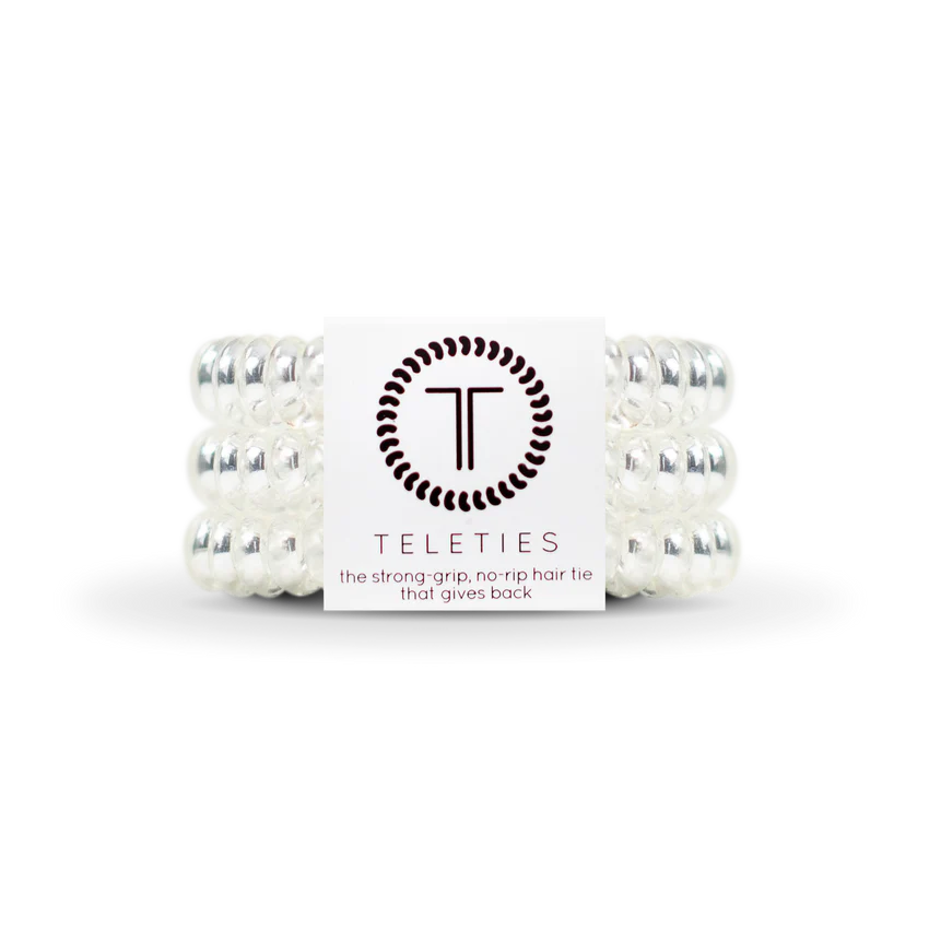 TELETIES Hair Ties are clear spiral hair ties designed for strong grip and no-rip functionality. Available sizes: Small, Large.