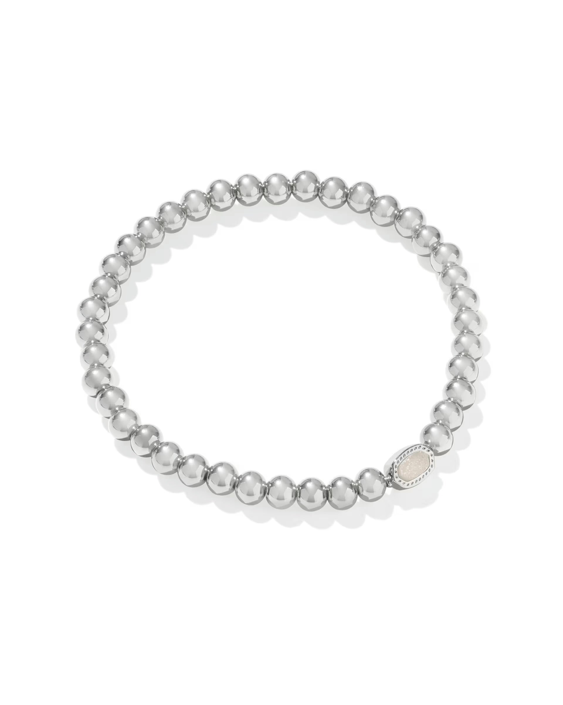 Mini Elaina Silver Stretch Bracelet by Kendra Scott with round silver beads and small oval tag. Available in one size.