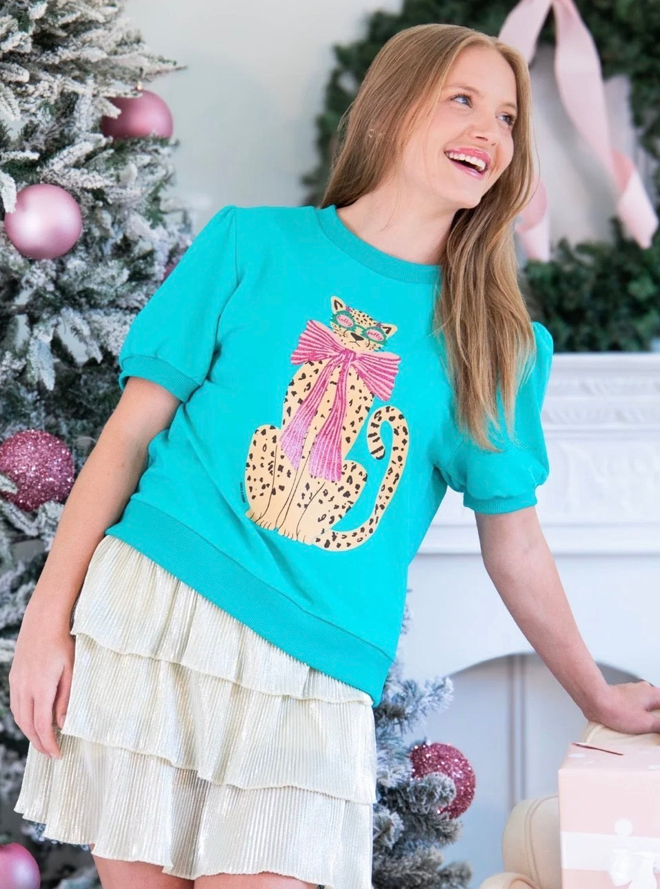 Teal Cheetah Puff Sleeve Tee featuring a mint glitter cheetah print with glasses and a pink bow. Available in all sizes.