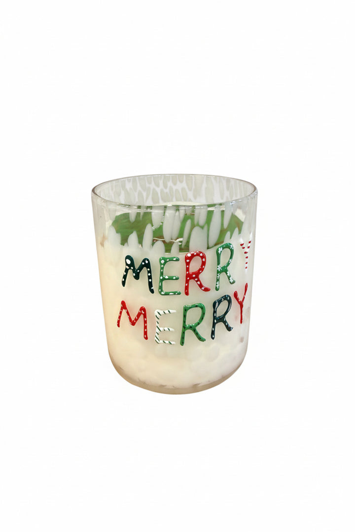 Holiday Soy Candle in glass holder with “MERRY MERRY” in colorful festive letters; available in multiple sizes.