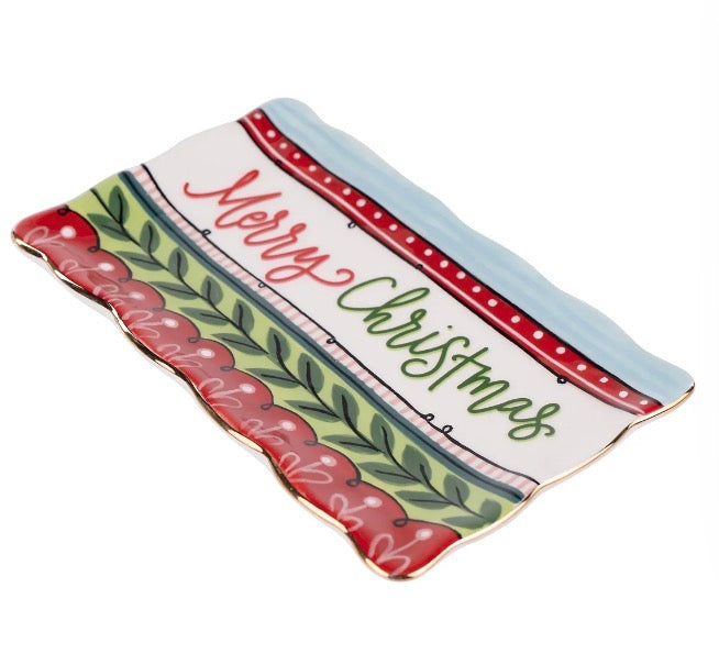 Bright Merry Christmas rectangular wavy-edge trinket tray with hand-painted green leaf and red dot pattern.