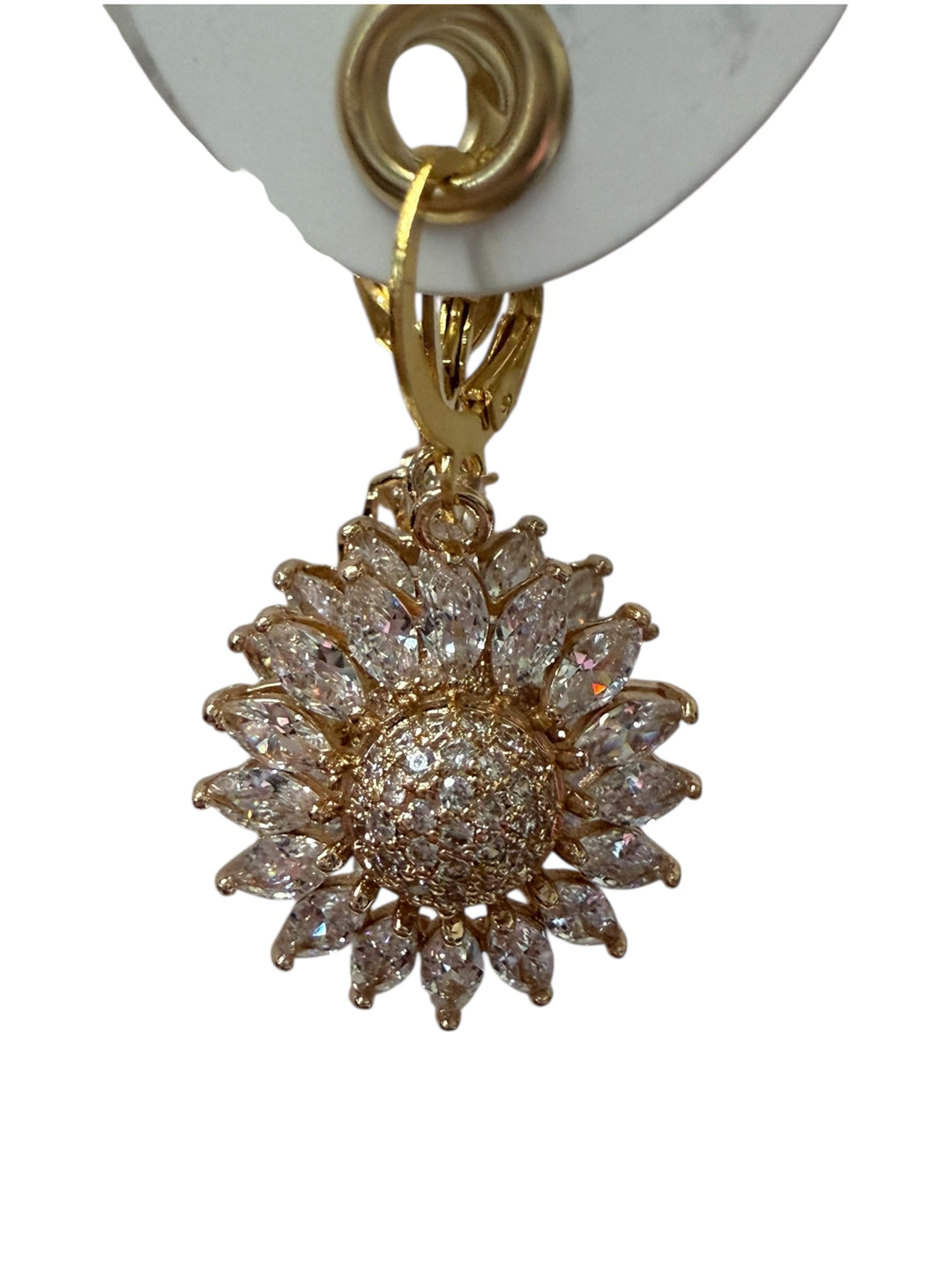 Gold sunflower-shaped earring with clear gemstones on petals and center. Available in small, medium, and large sizes.