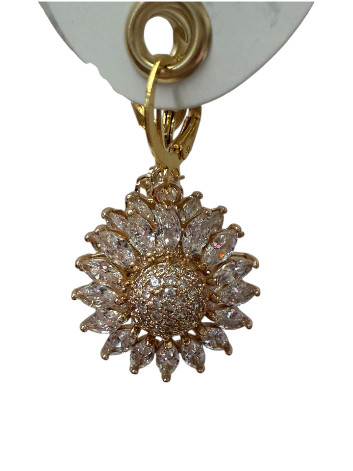 Gold sunflower-shaped earring with clear gemstones on petals and center. Available in small, medium, and large sizes.