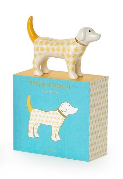 Posh Pooch Dog Ceramic Ring Holder, available in 3 assorted colors, features a ceramic dog figurine with yellow flower patterns and a yellow tail. Available sizes not specified.