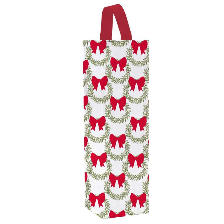 Holiday Wine Bag with festive red bow and green wreath design and red handle.
