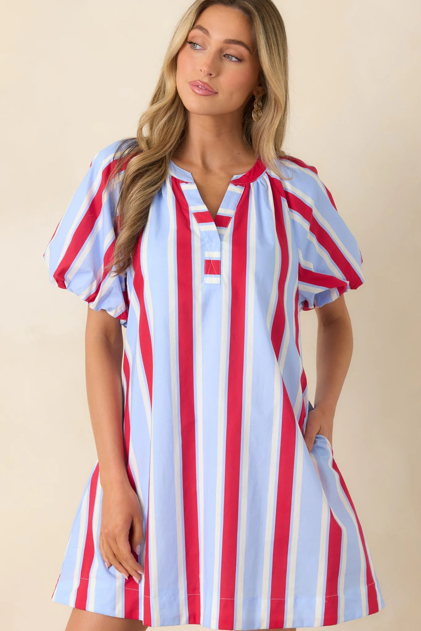 American Darling Stripe Dress: loose-fit summer dress with blue, white, and red stripes, puff sleeves, split neckline. Sizes S-XL.