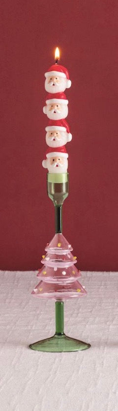 Four hand-painted Santa Claus mini taper candles.