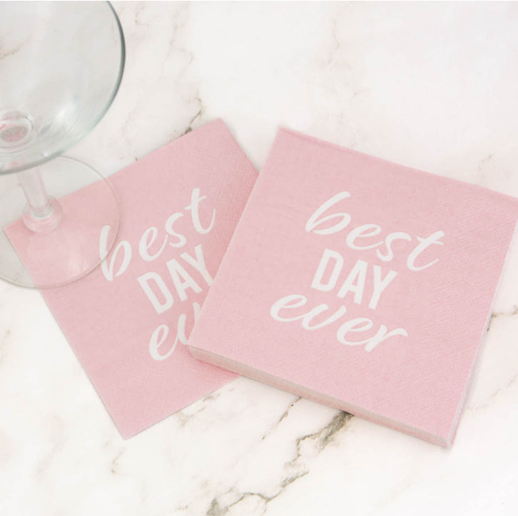 Pink "Best Day Ever" cocktail napkins with white text, pack of 20. Available size: standard cocktail napkin.