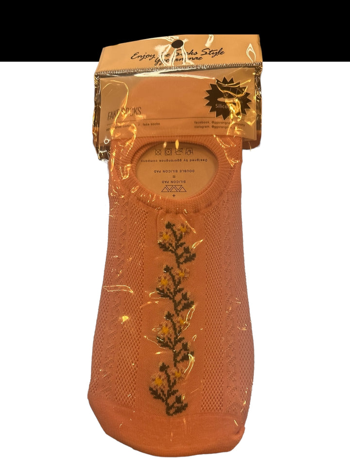 Peach women’s socks with yellow floral embroidery, decorative emblems, clear wrapper, beige “Enjoy Korea Style” label. Sizes: S–L.