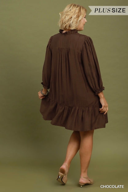Smocked Ruffle Tiered Mini Dress in chocolate brown, long sleeves, ruffled tiers. Available in plus sizes.