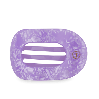 Rectangular marbled lavender hair claw with rounded edges, three wide openings, gold emblem; available in multiple sizes.