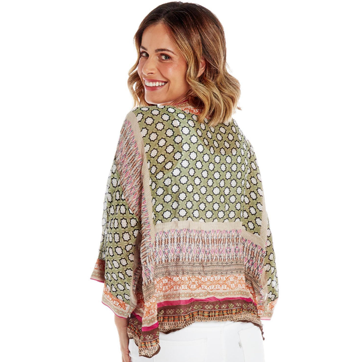 **Moorish Pattern Short Kimono:**

- Colors: Green, Pink, Beige
- Sizes Available: Small, Medium, Large
- Origin: Women-led textile company in Sheffield, England

Note: Internals are modeled with white pants.