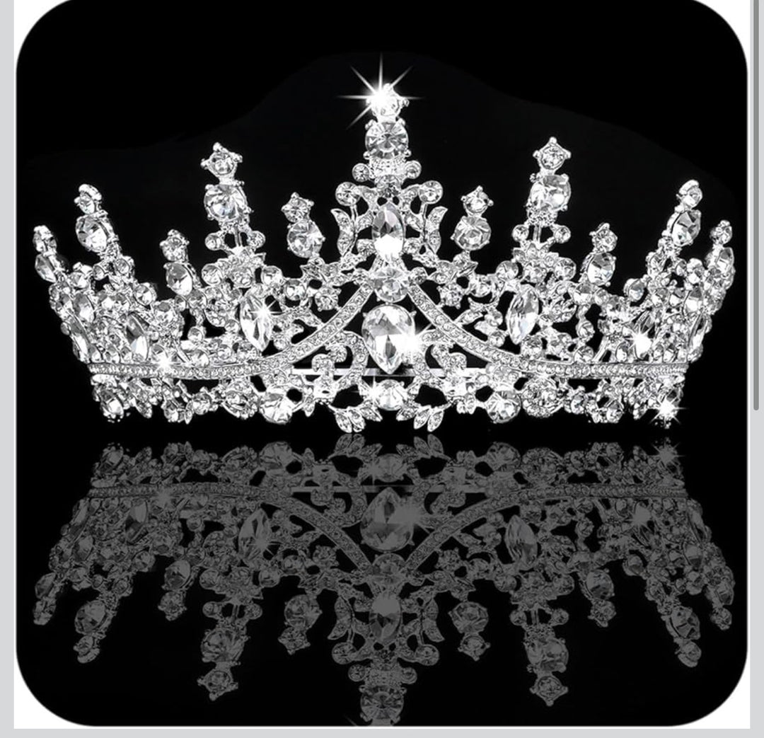 The Silver Star Tiara features clear gemstones and a stunning rhinestone design. Available sizes: small, medium, large.