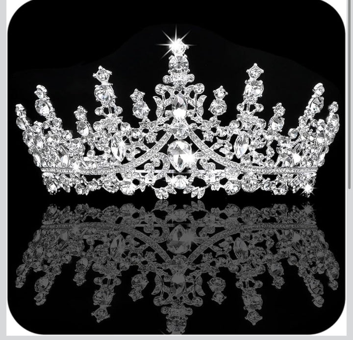 The Silver Star Tiara features clear gemstones and a stunning rhinestone design. Available sizes: small, medium, large.