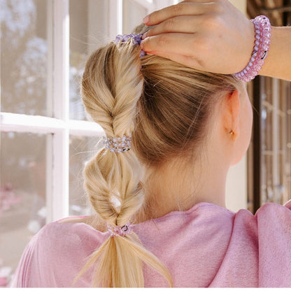 Classic Lavender Mist TELETIES secure a bubble ponytail; available in small, medium, and large.