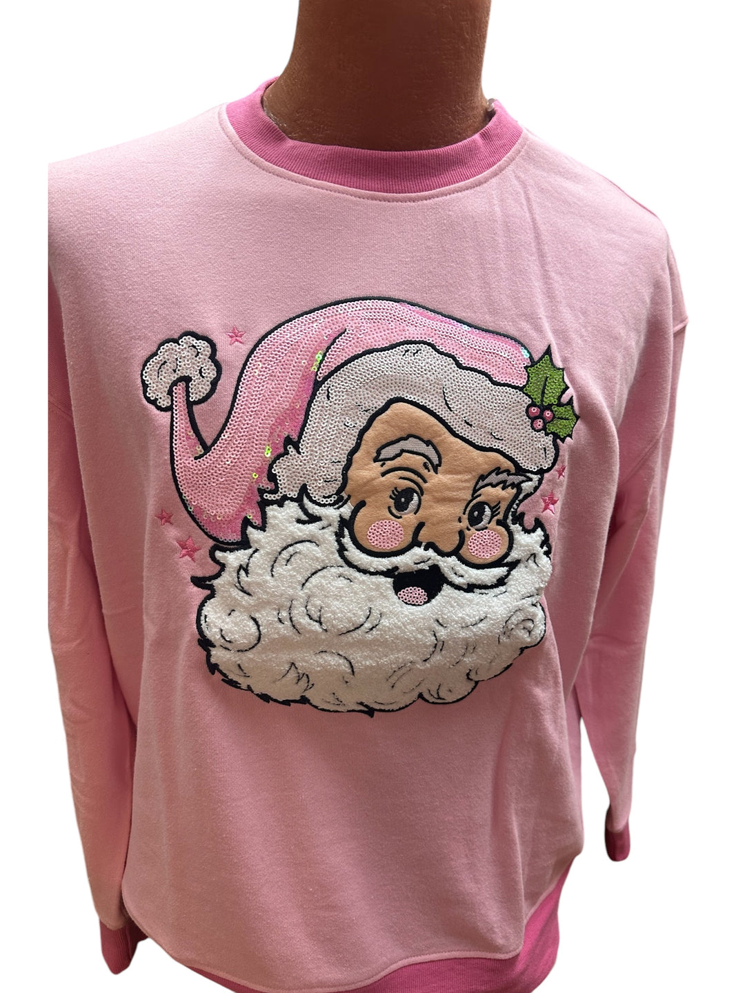 Jolly Pink Santa Sweater: light pink crewneck with sequined Santa face. Available in all sizes.