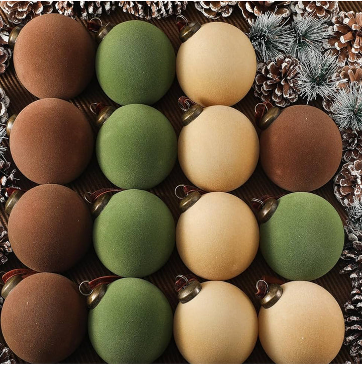 Sixteen matte flocked velvet Christmas balls in brown, olive green, and beige.