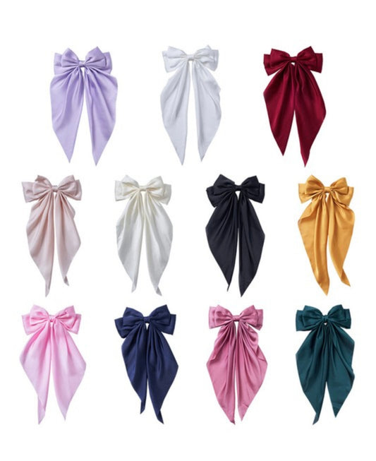 A collection of twelve Bow Ribbon Hair Clips in vibrant colors: light purple, white, dark red, light pink, cream, black, mustard yellow, pink, navy blue, dark pink, and teal. Available in one size.