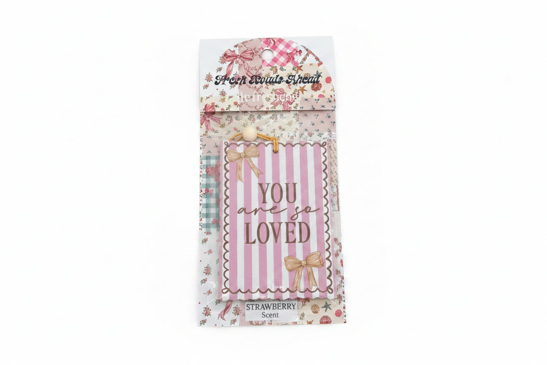 SIMPLY SOUTHERN FRESH ROADS AHEAD air freshener with pink/white stripes, "YOU are so LOVED," bow decor, strawberry scent. Sizes: N/A.