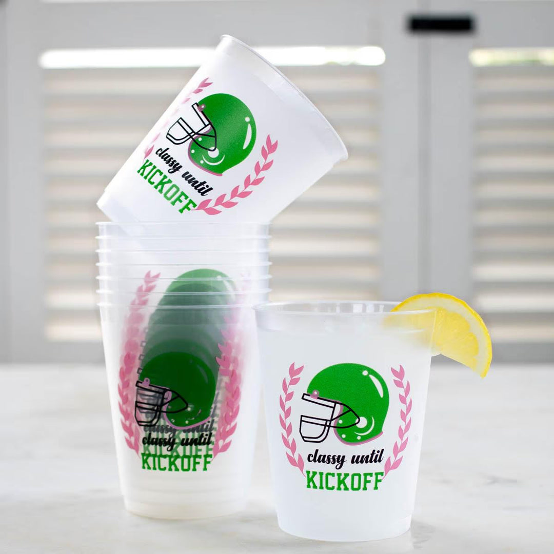 Dishwasher-safe “Classy Until KICKOFF” cups with green football helmet; available in 12oz and 16oz sizes.