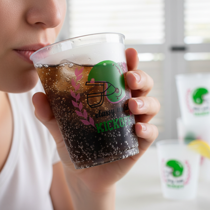 Classy Until Kickoff Party Cup with green football helmet and bold text, available in 16 oz. Filled with a dark, fizzy drink.
