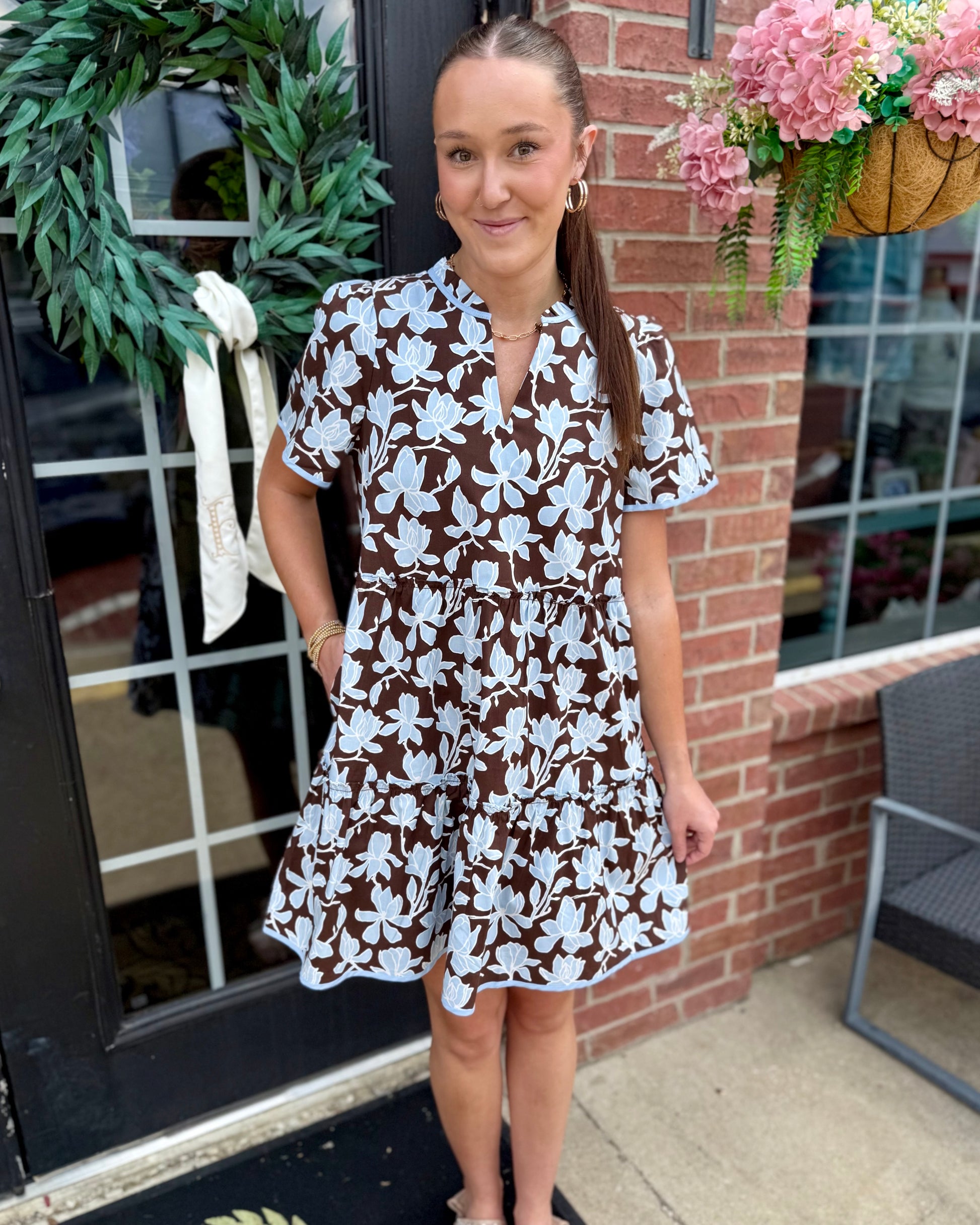 Ivy Growing Grace Blue Mini Dress with a relaxed fit, light blue floral patterns, and matching trim. Available in sizes XS–XL.