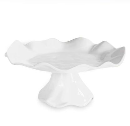 White ceramic pedestal cake stand with ruffled edge; available in small size.
