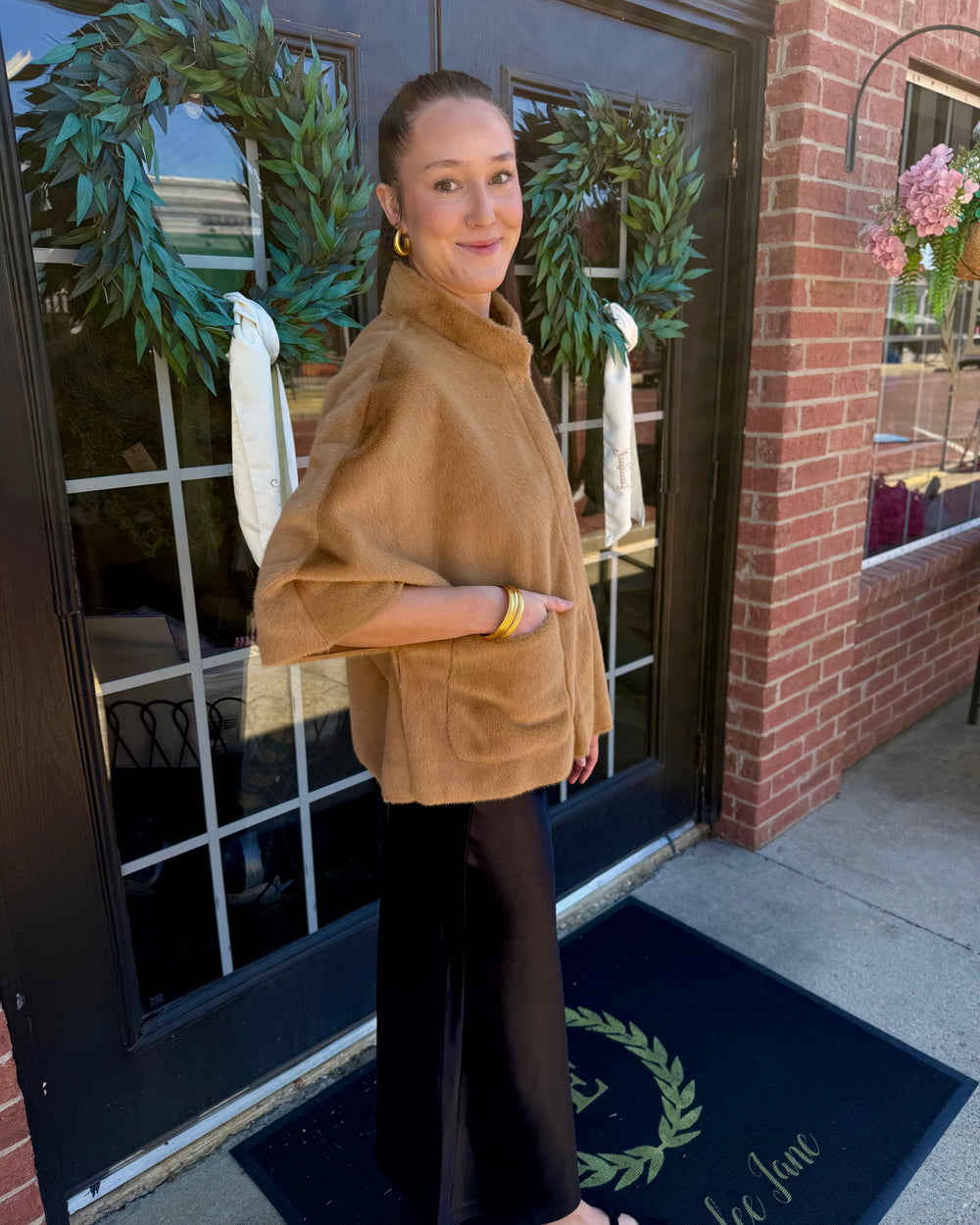 Tan Arabella faux fur capelet with high collar and wide sleeves. Available in all sizes.