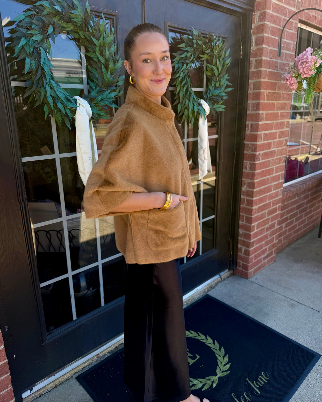 Tan Arabella faux fur capelet with high collar and wide sleeves. Available in all sizes.
