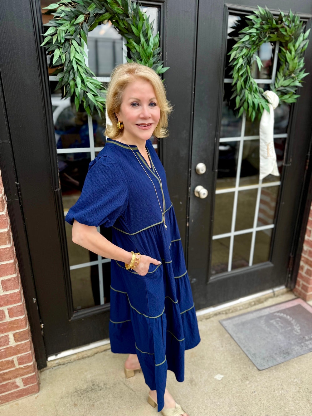 Kinsley Navy Seersucker Dress, available in sizes XS-XL. Classic navy seersucker design with a tailored fit.