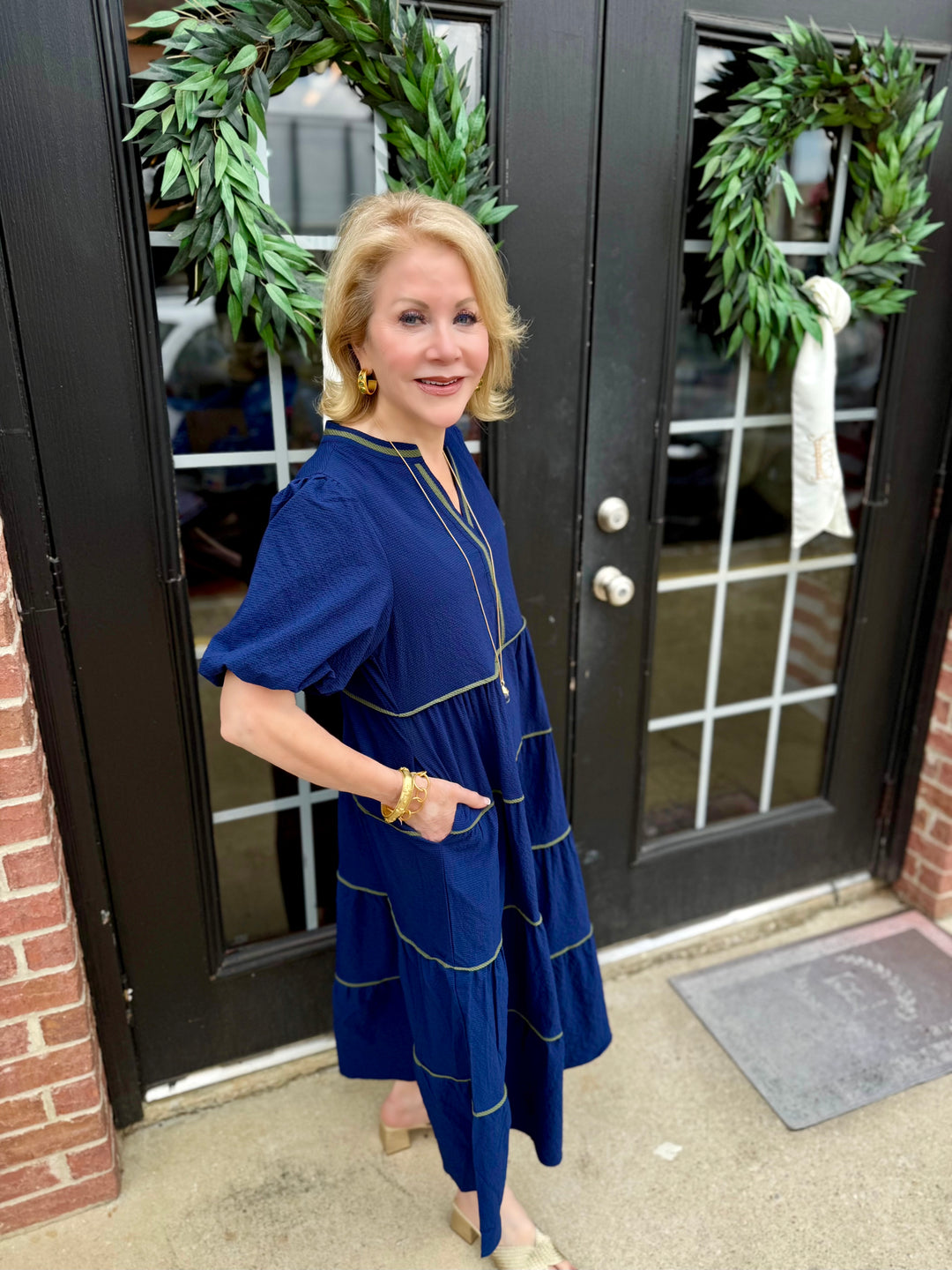 Kinsley Navy Seersucker Dress, available in sizes XS-XL. Classic navy seersucker design with a tailored fit.