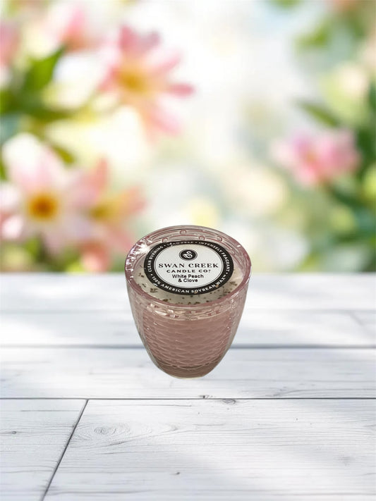 White Peach & Clove Small Cathedral Vase Candle by Swan Creek Candle Co.; available in small size.