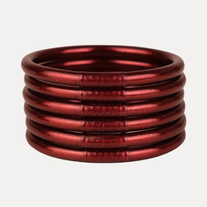 Six shiny Merlot All Weather Bangles with center textured patterns. Handmade, waterproof, and available in sizes small, medium, large.