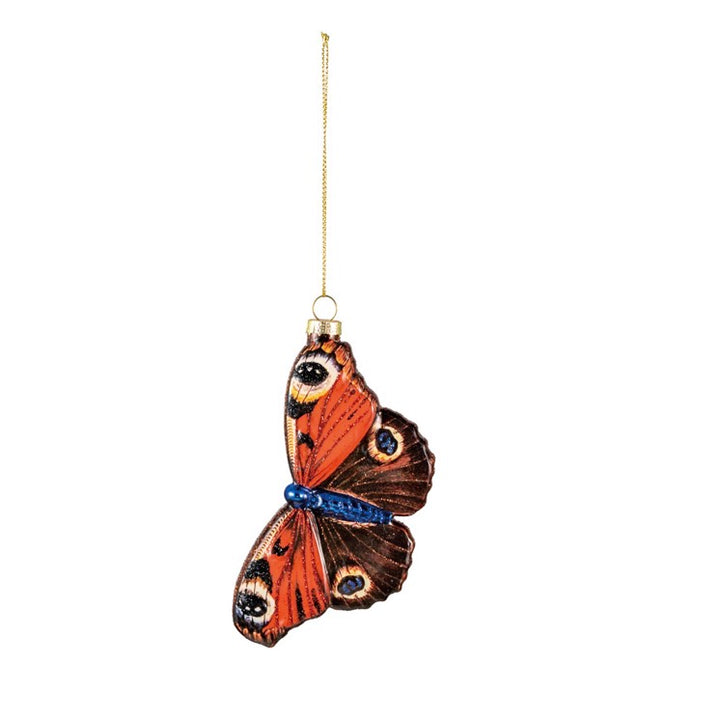 Hand-painted orange, black, and blue mercury glass butterfly ornament with gold hanging thread.