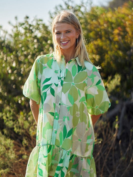 Penny Floral Print Mini Dress: short sleeves, leaf print, ideal for spring/summer. Available in XS-XL.