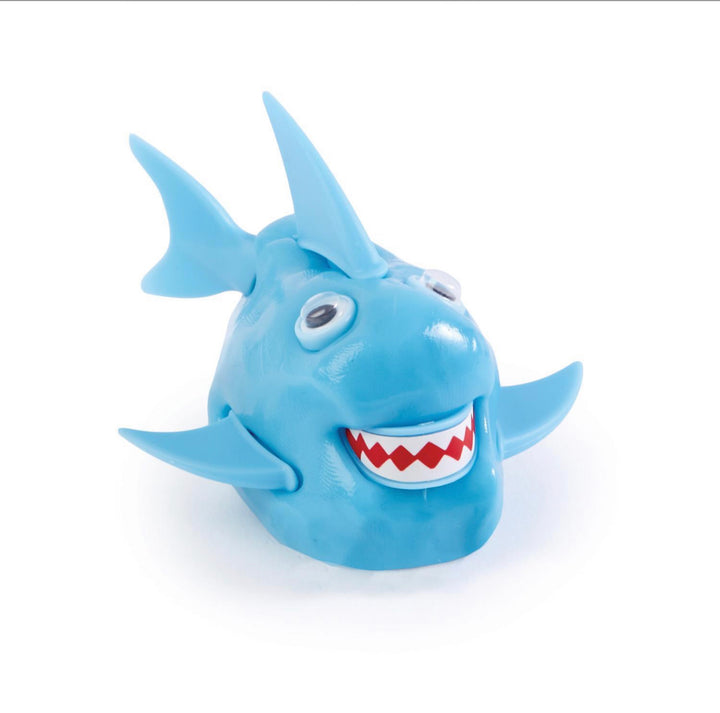 Blue plastic toy cartoon shark head with big eyes, open mouth, white teeth, red gums, exaggerated fins; sizes available.