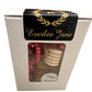 White box with clear window displays Car Diffusers labeled "Very Vanilla." Black and gold label at the top reads "Everlee Jane" with a laurel wreath design. Inside, red decorative elements. Available sizes: Standard.