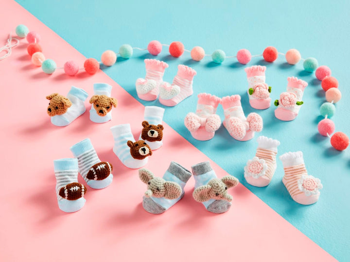 Crochet Rattle Toe Socks in pastel shades with playful animal, flower, and football designs; available in S, M, L.
