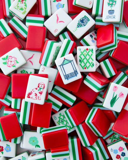 Nantucket Mahjong Tiles in red, white, and green with designs of flowers, a dog, a vase, and "JOKER." Available sizes: standard tile dimensions.
