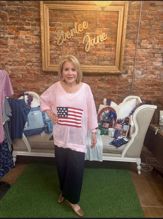 Americana Flag Sweater with a pink hue; available in sizes S-XL.