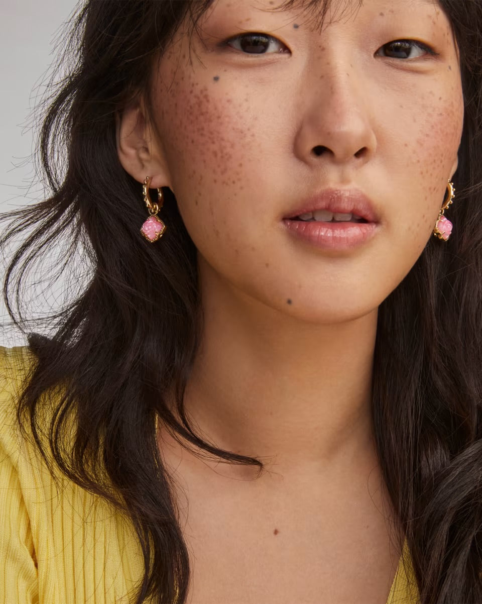 Mallory Rose Gold Huggie Earrings by Kendra Scott with vintage-inspired pink gemstones. Available in small and medium sizes.