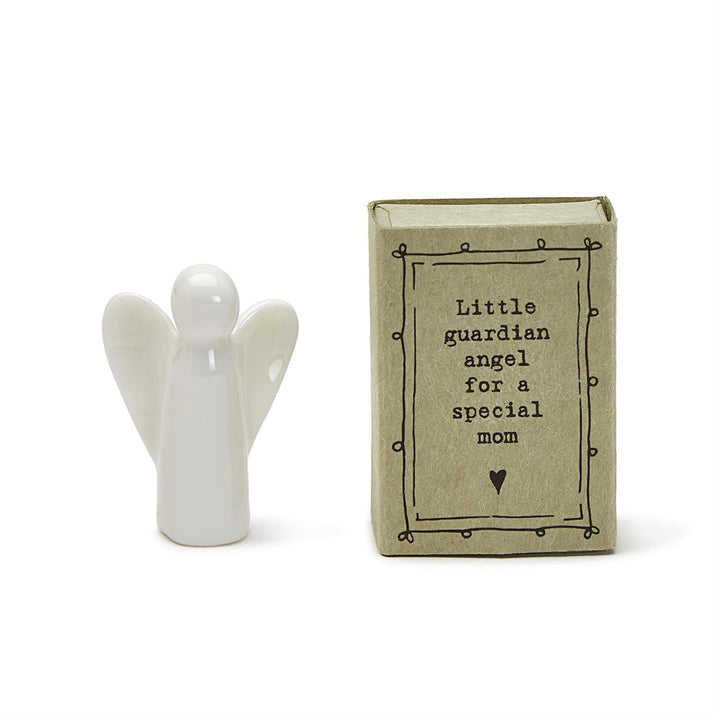 Small white ceramic angel figurine in a gift box labeled "Little guardian angel for a special mom." Sizes: 1.5–2 inches.