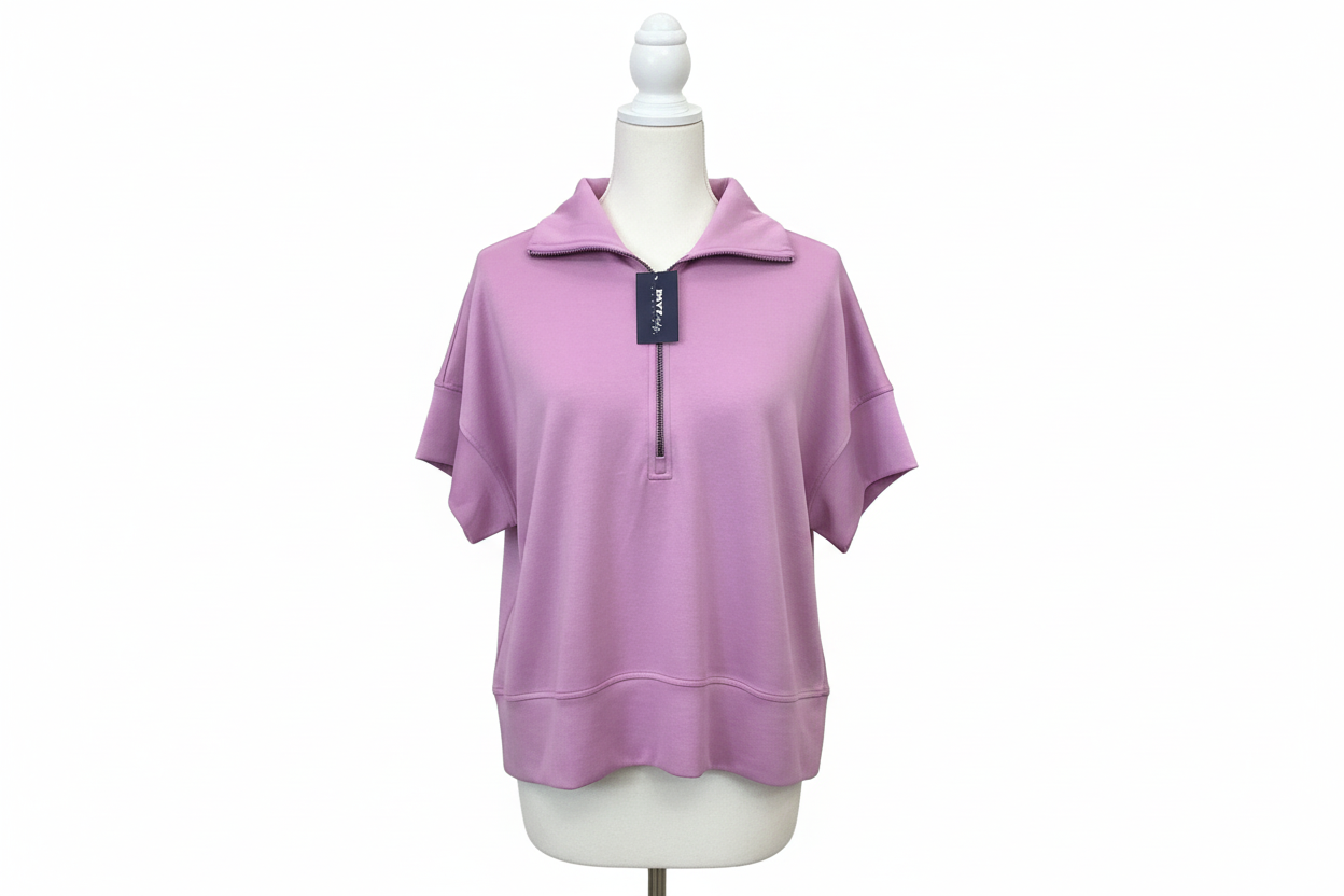Lilac Short Sleeve Zip Up Top by White Birch with collar, half-zip front, breathable fabric. Available in S-XL.