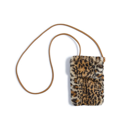 Mini faux fur crossbody bag with brown and black leopard print, long tan strap; available in one size.